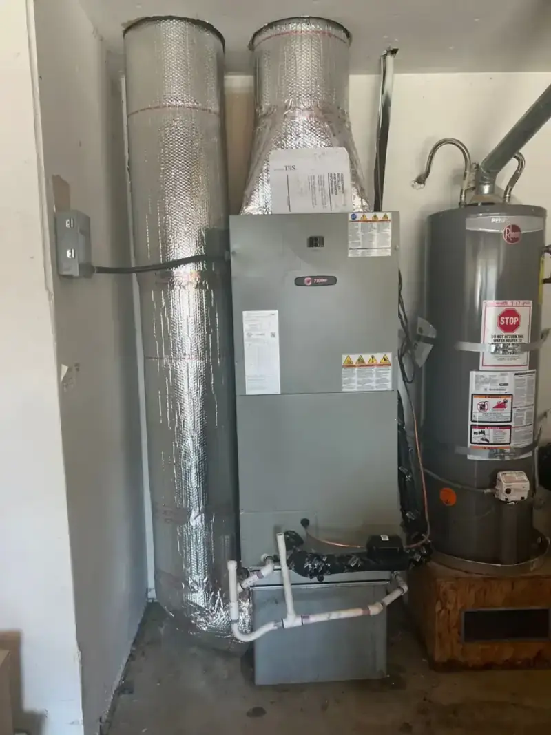 HVAC technician performing maintenance tune-up
